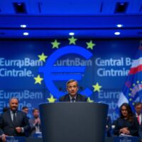 European Central Bank press conference podium with microphones in Frankfurt