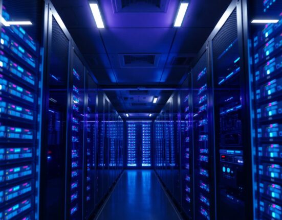 Modern data center server racks with blue LED lighting representing Ethereum blockchain infrastructure.