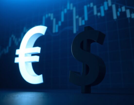 Dimmed Euro symbol next to bright US Dollar symbol on financial market background