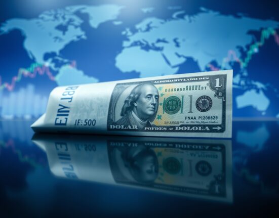 Euro and US dollar banknotes side by side, representing EUR/USD exchange rate dynamics.