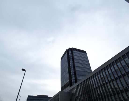 European Central Bank headquarters in Frankfurt with overcast sky