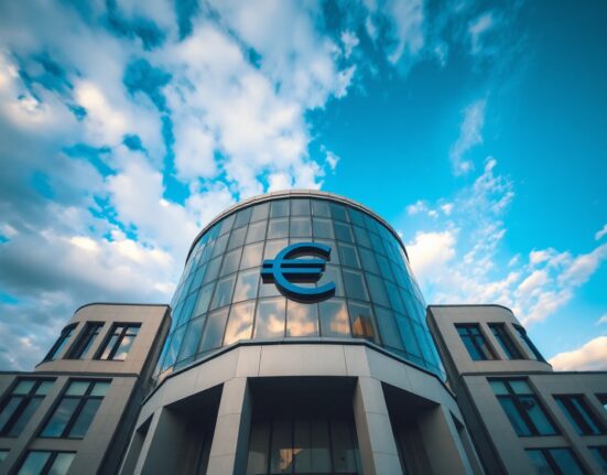 European Central Bank headquarters in Frankfurt with Euro symbol reflection