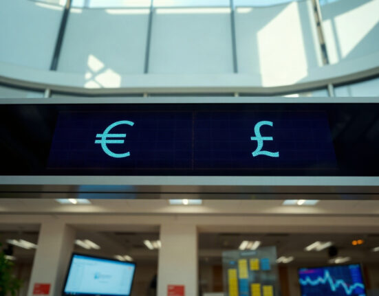 Euro and British Pound exchange rate displayed on a financial screen