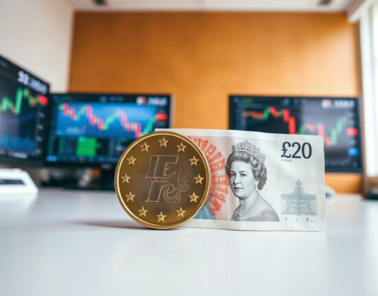 Euro coins and British Pound banknotes on a desk, symbolizing EUR/GBP exchange rate focus