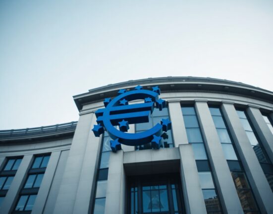 European Central Bank headquarters in Frankfurt with euro sculpture, representing Eurozone inflation data.