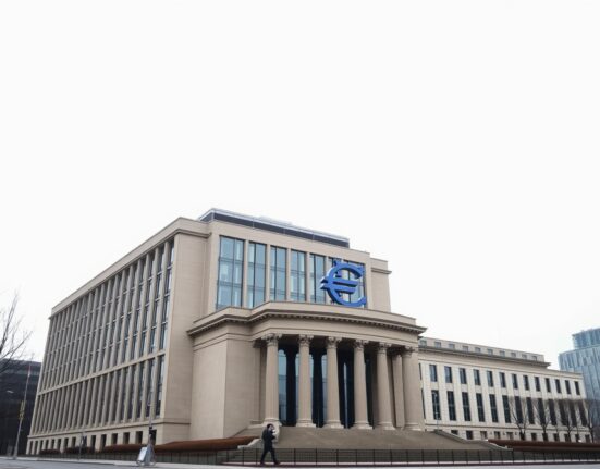 European Central Bank headquarters in Frankfurt, Germany, on a cloudy day.