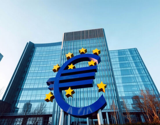 European Central Bank headquarters in Frankfurt with Euro sculpture