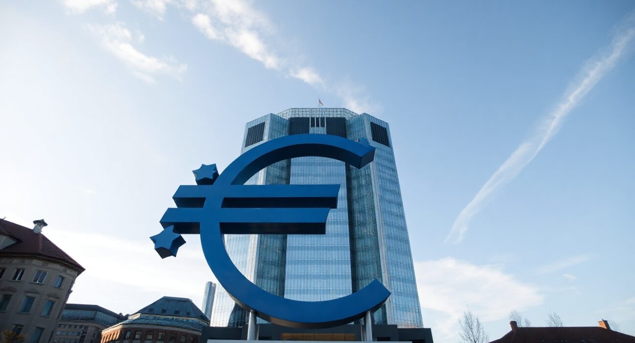 Eurozone trade balance improved to a surplus in June, with the European Central Bank in Frankfurt symbolizing economic stability.