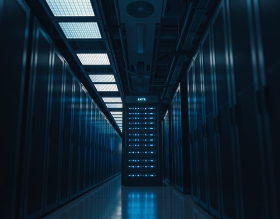 Interior of a data center with server racks and blue LED lights, representing AI model training infrastructure.