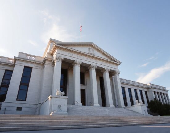 Federal Reserve building in Washington, D.C., with clear sky, representing monetary policy and inflation discussions.