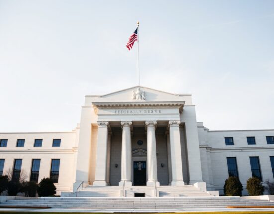Federal Reserve building in Washington D.C. on a clear day, ahead of a pivotal June policy meeting.