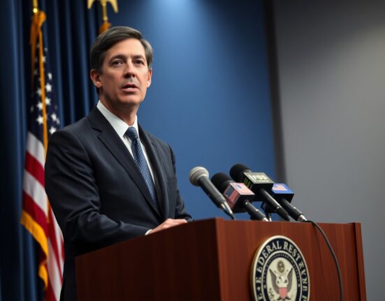 Federal Reserve Governor Kevin Warsh speaking at a press conference