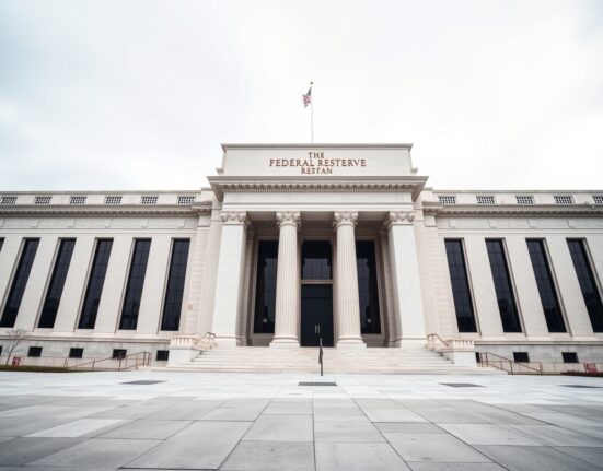 Exterior of the Federal Reserve building in Washington D.C. under overcast sky