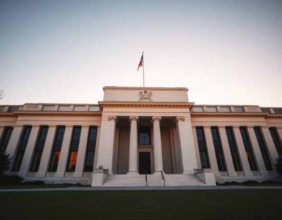 Exterior of the Federal Reserve building in Washington, D.C., during golden hour.