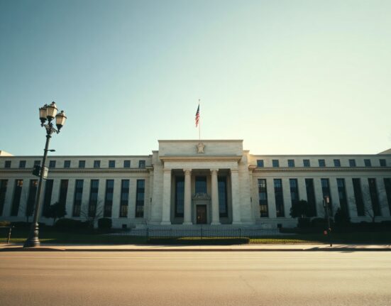 Federal Reserve building in Washington, D.C., under clear daylight sky