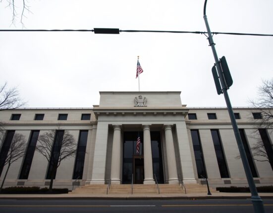 Exterior of the Federal Reserve building in Washington, D.C. under overcast skies.