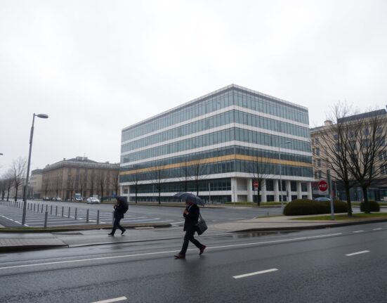 Overcast view of a business district in Paris with few pedestrians, representing slowing economic activity in France.