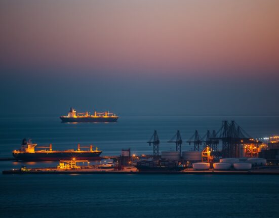 Fujairah port oil terminal with tankers during operational suspension affecting Middle East energy exports.