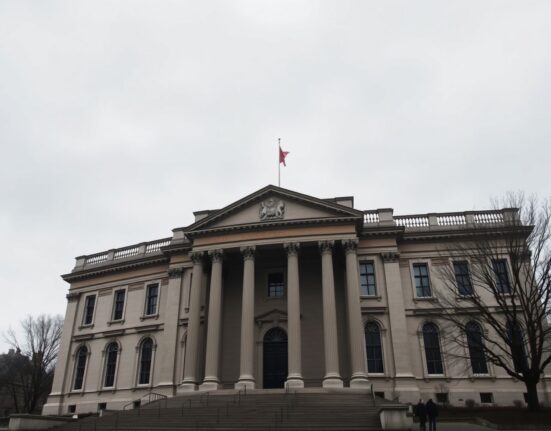 Bank of England building on a cloudy day representing GBP stability amid political risk