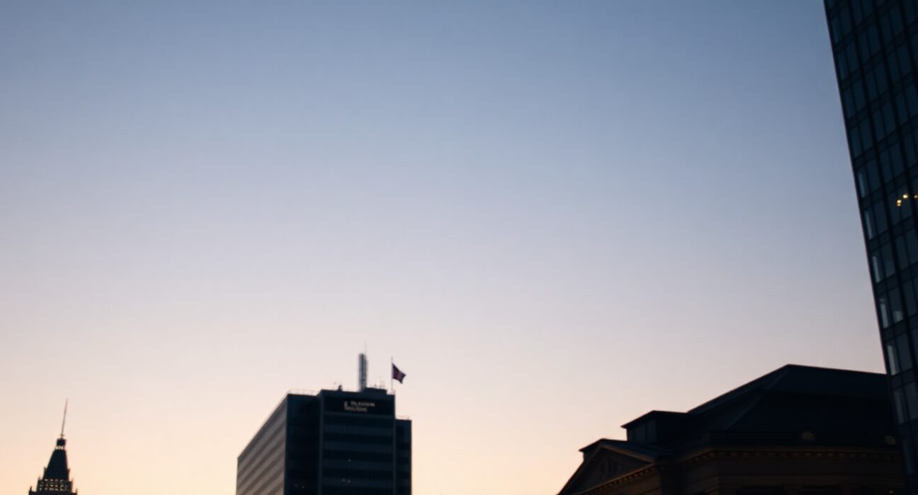 Frankfurt skyline with ECB headquarters at dusk, representing German bond market stability.