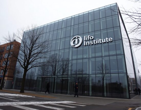 Ifo Institute building in Munich on a cloudy day, representing German economic data and business climate analysis.