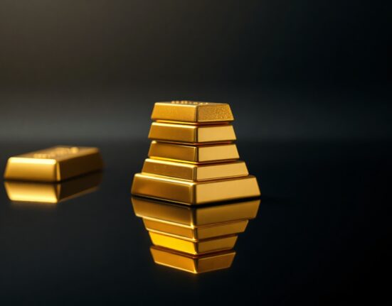Stack of polished gold bars on a dark reflective surface, representing gold price stability above $4,300.