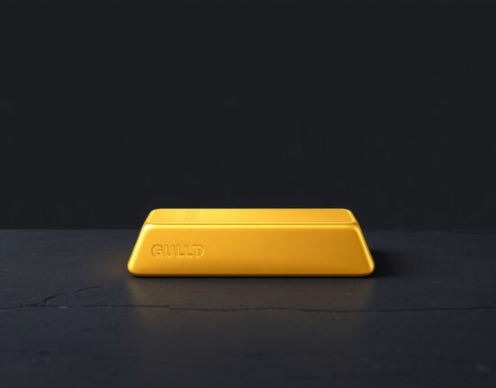 Gold bullion bar representing the falling gold price breaching below $4,600.