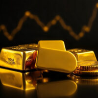 Gold bars and coins on reflective surface with subtle price chart background