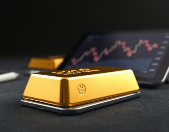 Gold bullion bar with chart showing price decline, representing the gold price drop from $4,600.