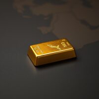 Gold bullion bar representing safe-haven demand during Middle East geopolitical tensions.