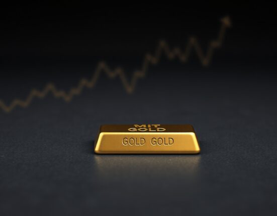 Gold bullion bar representing stable gold prices ahead of key US inflation data release.