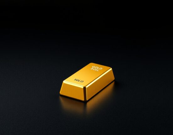 Gold bullion bar representing market price movements ahead of US inflation data.