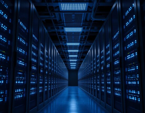 Google Cloud data center interior showing server racks with blue lighting, representing AI cloud infrastructure growth