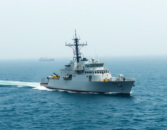 U.S. Navy minesweeper conducting operations in the strategic Strait of Hormuz to clear Iranian naval mines.