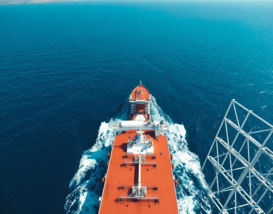 Aerial view of an oil tanker transiting the Strait of Hormuz amid heightened maritime security concerns.