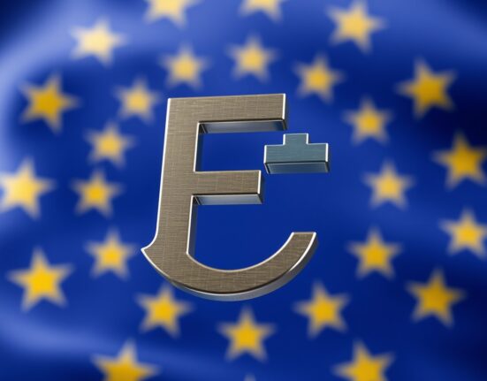 Hungarian forint currency symbol gains strength against the euro, marking a key economic milestone.