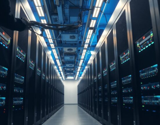 Data center with server racks symbolizing Hyperliquid's low-latency on-chain data infrastructure.