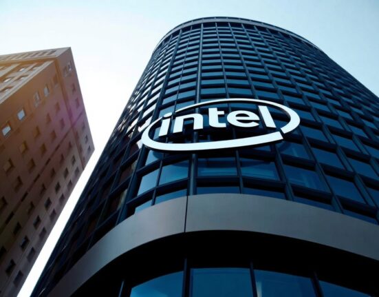 Intel headquarters with logo under clear sky, representing the company's $15 billion equity raise announcement.