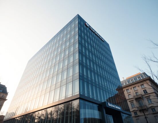 Exterior of Intesa Sanpaolo headquarters in Milan on a sunny day