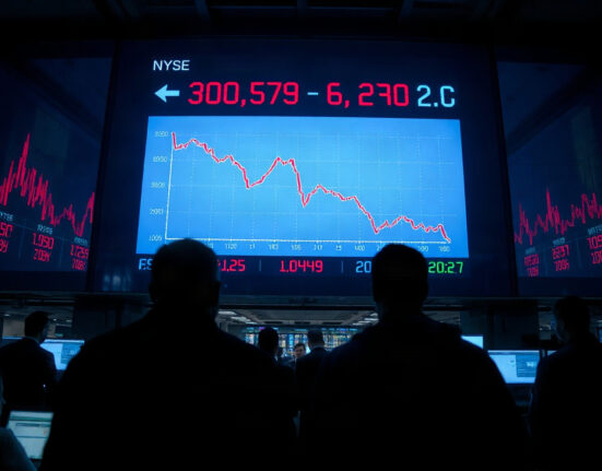 Stock market board showing red numbers and declining graph after Iran attack