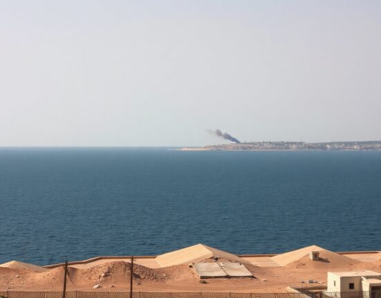 Smoke rising from Qeshm Island coastline after US military strikes, Iran
