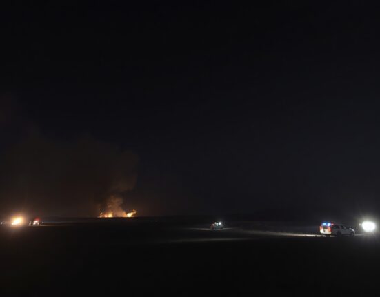 Night sky illuminated by explosions near a military base in the Persian Gulf region