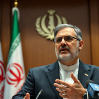 Iranian Foreign Minister Abbas Araghchi speaking at a press conference