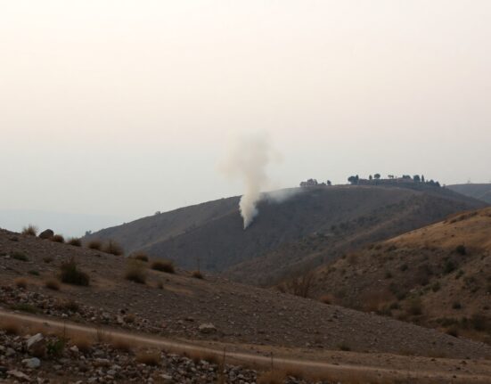 Smoke rises from a hillside in southern Lebanon after an Israeli artillery strike amid clashes with Hezbollah.