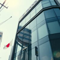 A modern bank building in Tokyo, Japan, symbolizing the country's banking sector and lending activity.