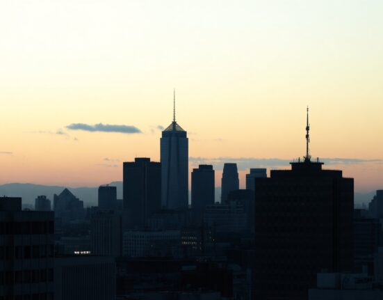 Tokyo skyline at dusk with the Bank of Japan building in focus, symbolizing Japan's economic indicators.