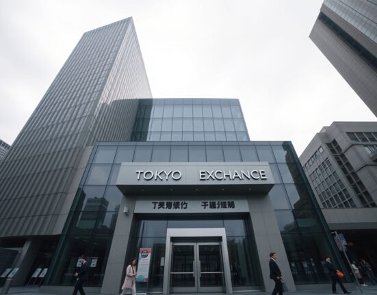 Tokyo Stock Exchange building in financial district on a cloudy day.