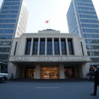 Tokyo Stock Exchange building on a clear day, symbolizing Japan's economic performance in Q2 2026.