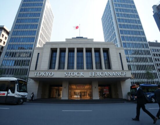 Tokyo Stock Exchange building on a clear day, symbolizing Japan's economic performance in Q2 2026.