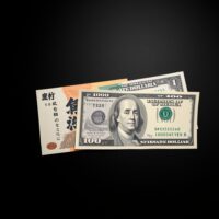 Japanese Yen and US Dollar banknotes on a desk representing currency exchange rate analysis.